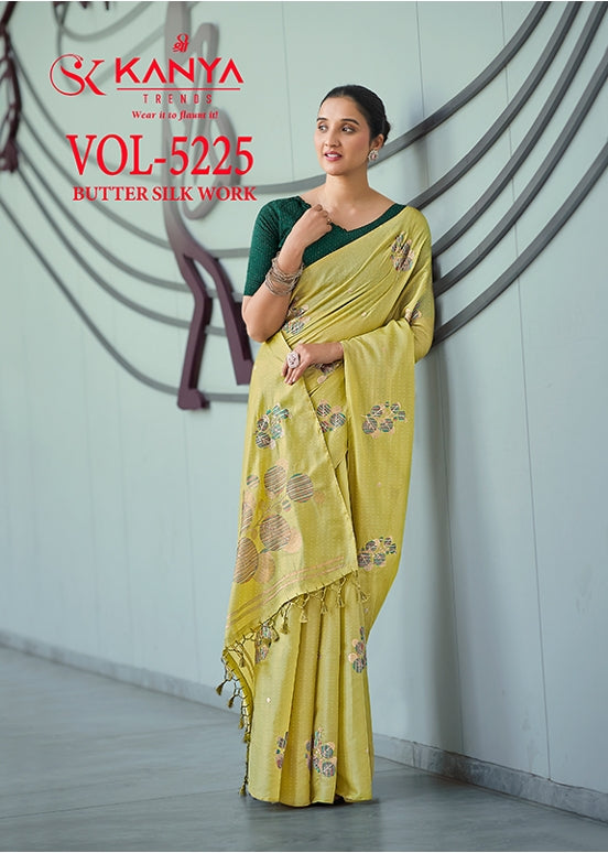 Mustard yellow embroidered saree with matching blouse, floral motifs and draped border