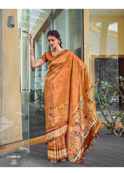 Rust orange silk saree with zari border and Kalamkari mural print, draped pallu