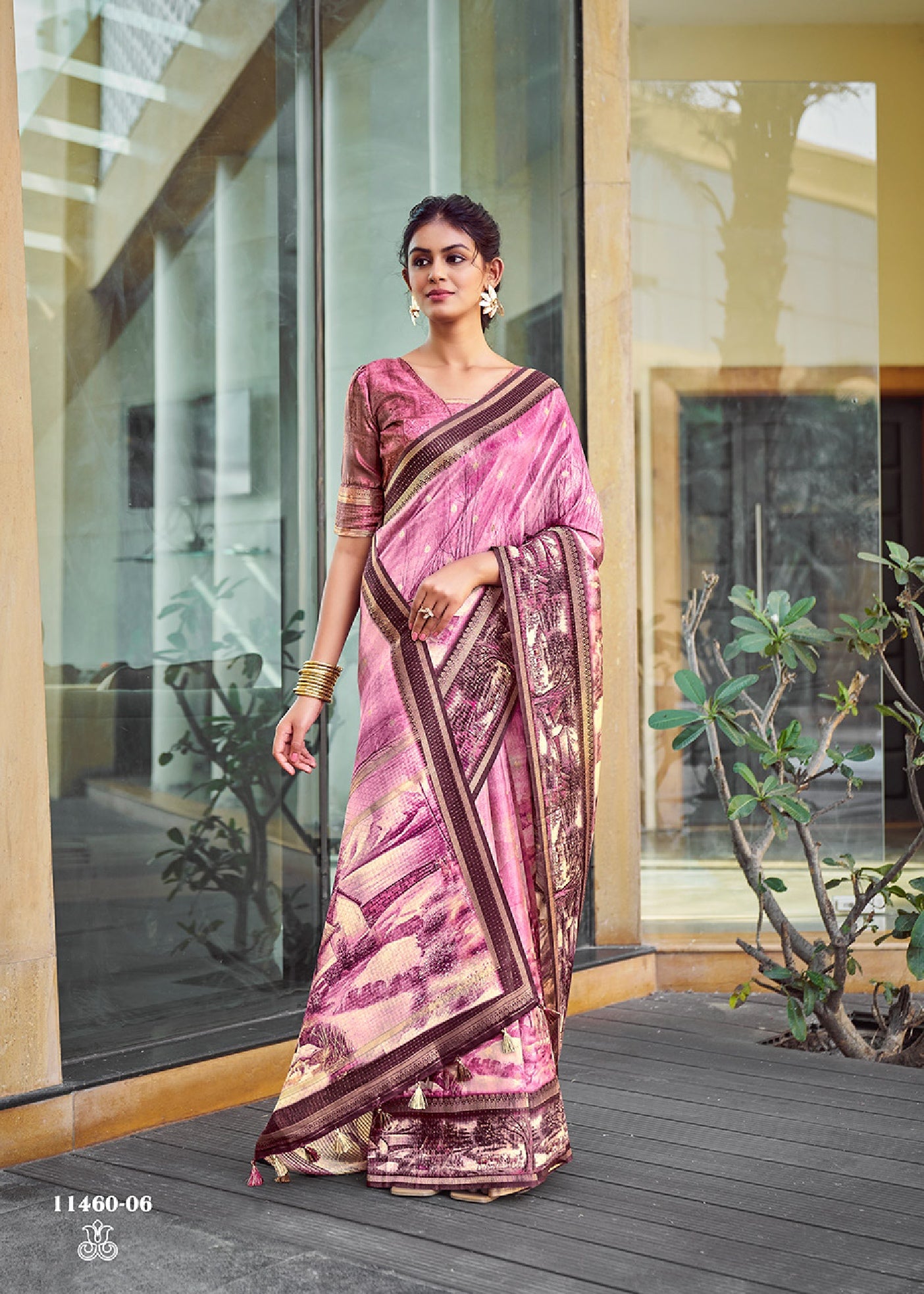 Magenta pink silk saree with zari border and Kalamkari mural print, draped pallu