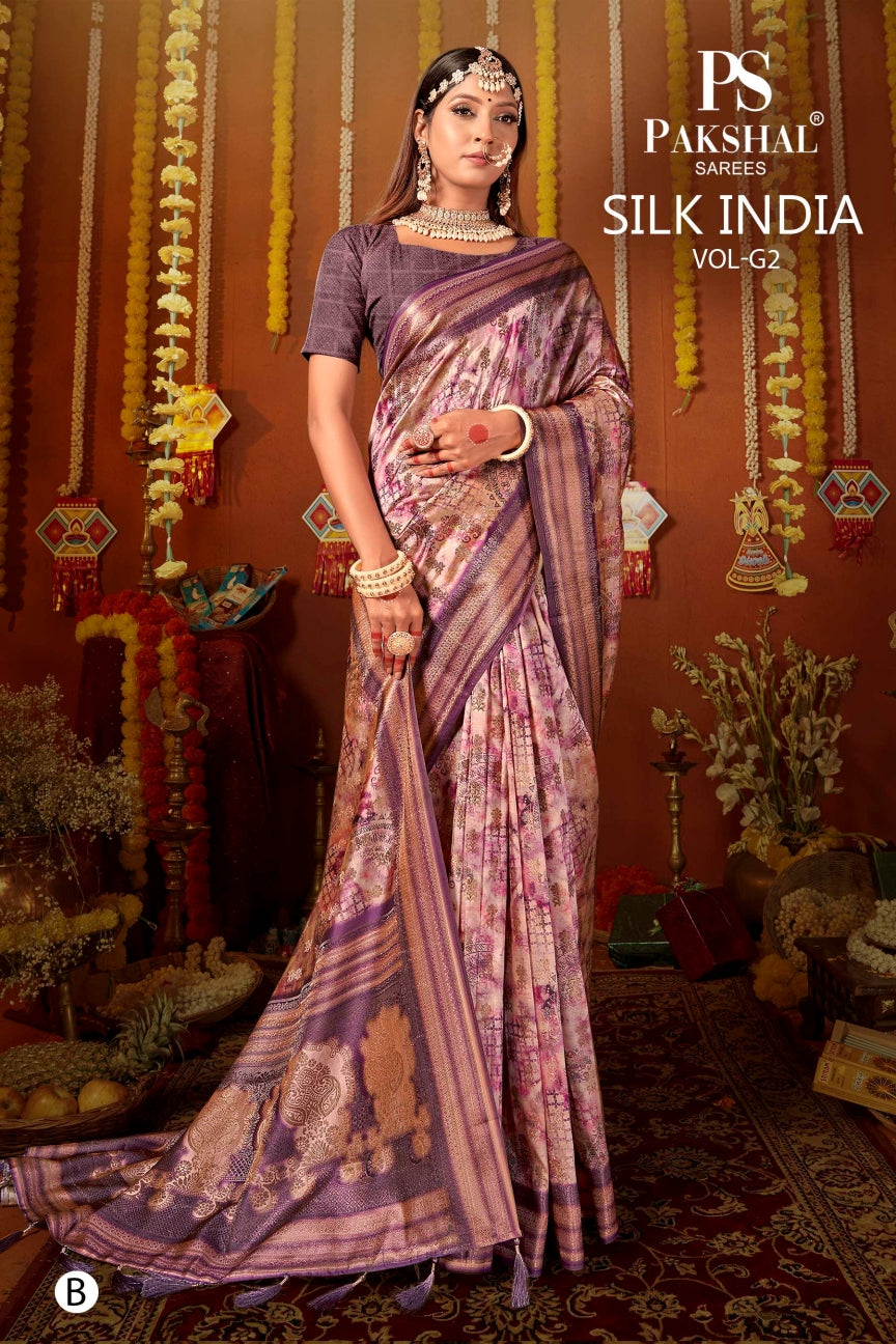 Purple-pink silk saree with zari border and allover woven motifs