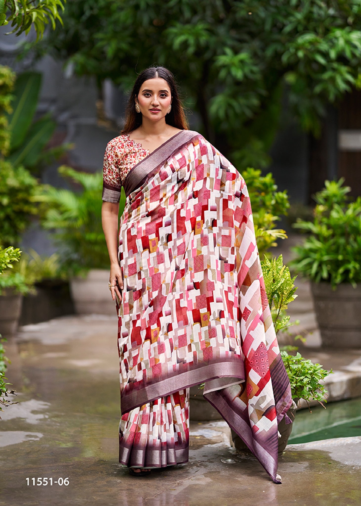 Coral pink abstract print linen saree with check pattern and dark contrast border