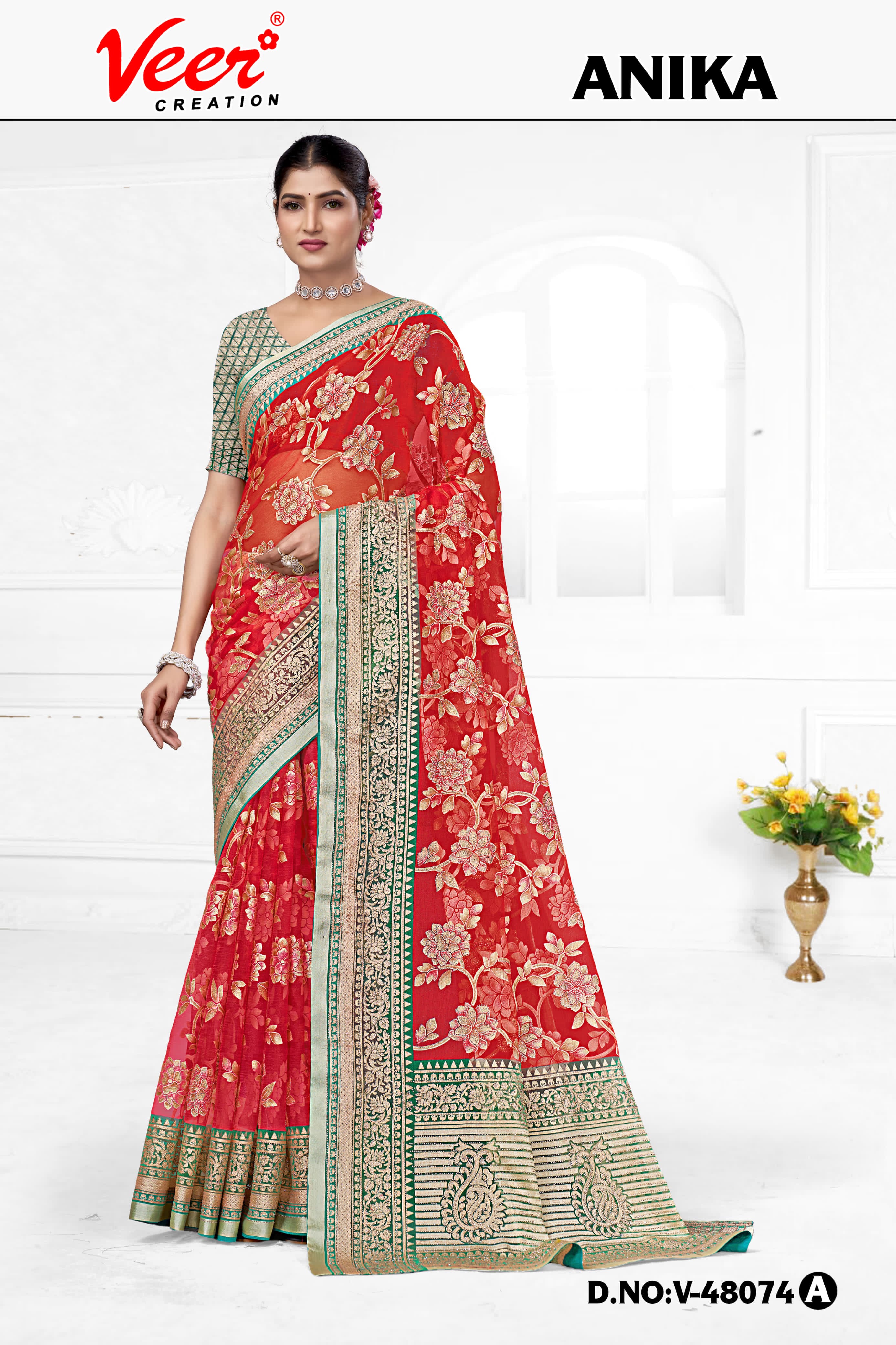 Red floral net saree with zari border and patterned pallu