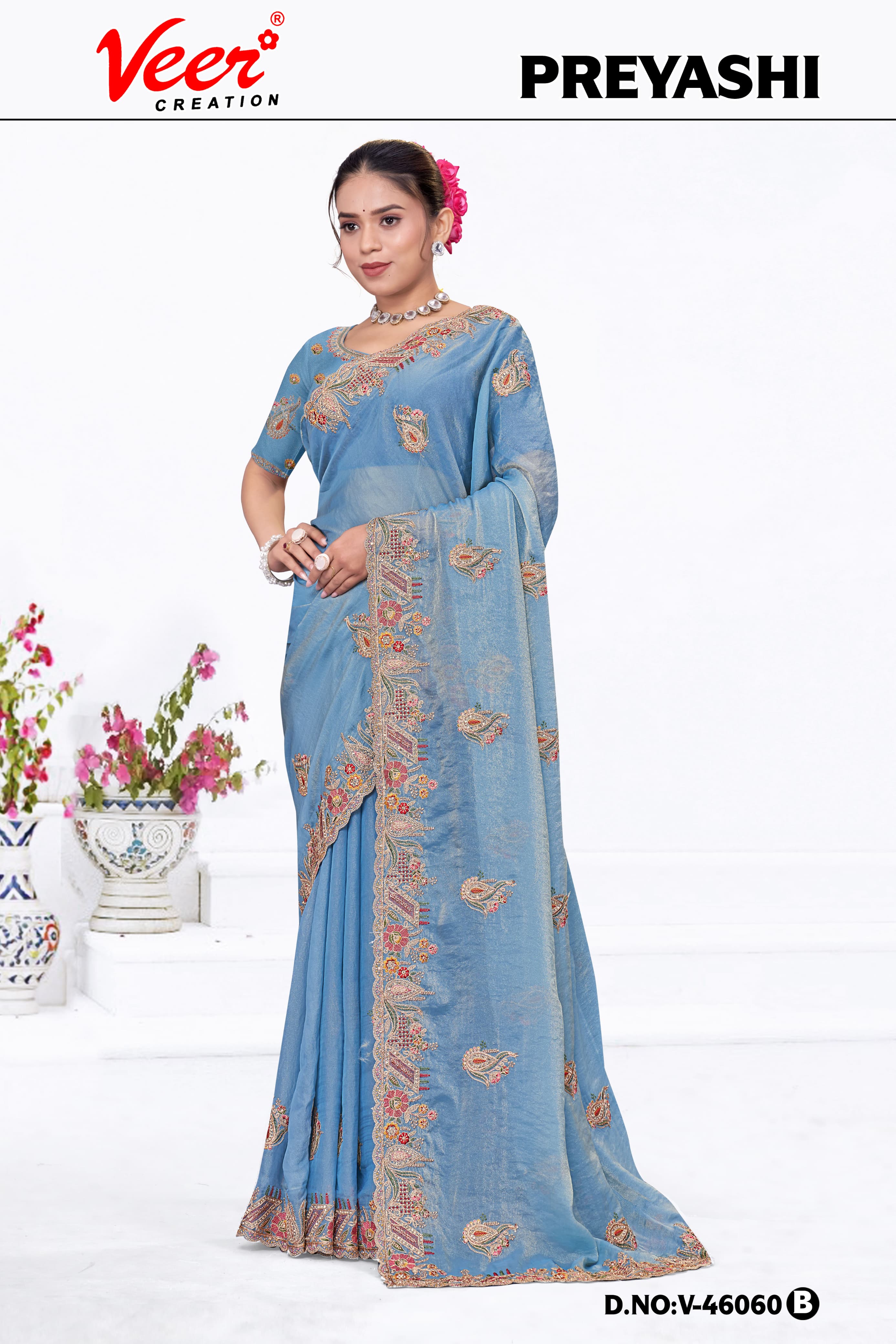 Steel blue embroidered saree with scalloped border and gold-toned floral work