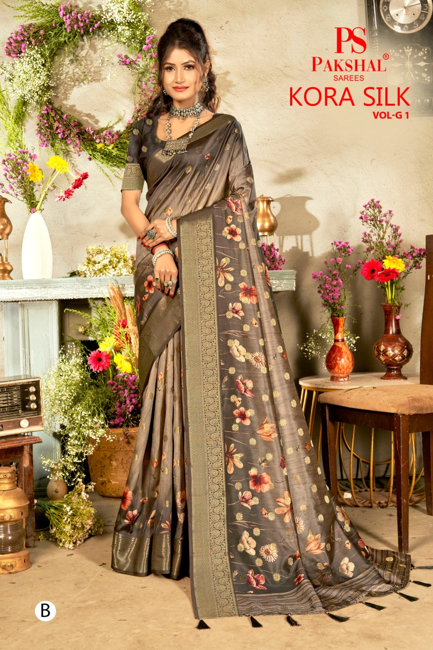 Dark gray floral silk saree with woven gold border and patterned pallu