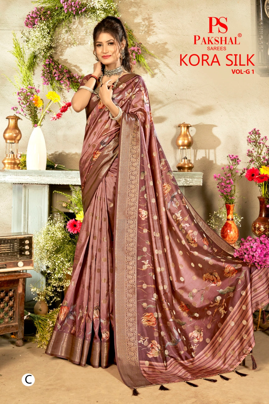 Mauve floral silk saree with woven gold border and patterned pallu