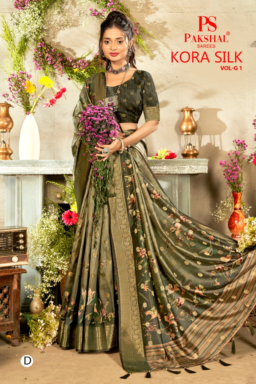 Dark green floral silk saree with woven gold border and patterned pallu