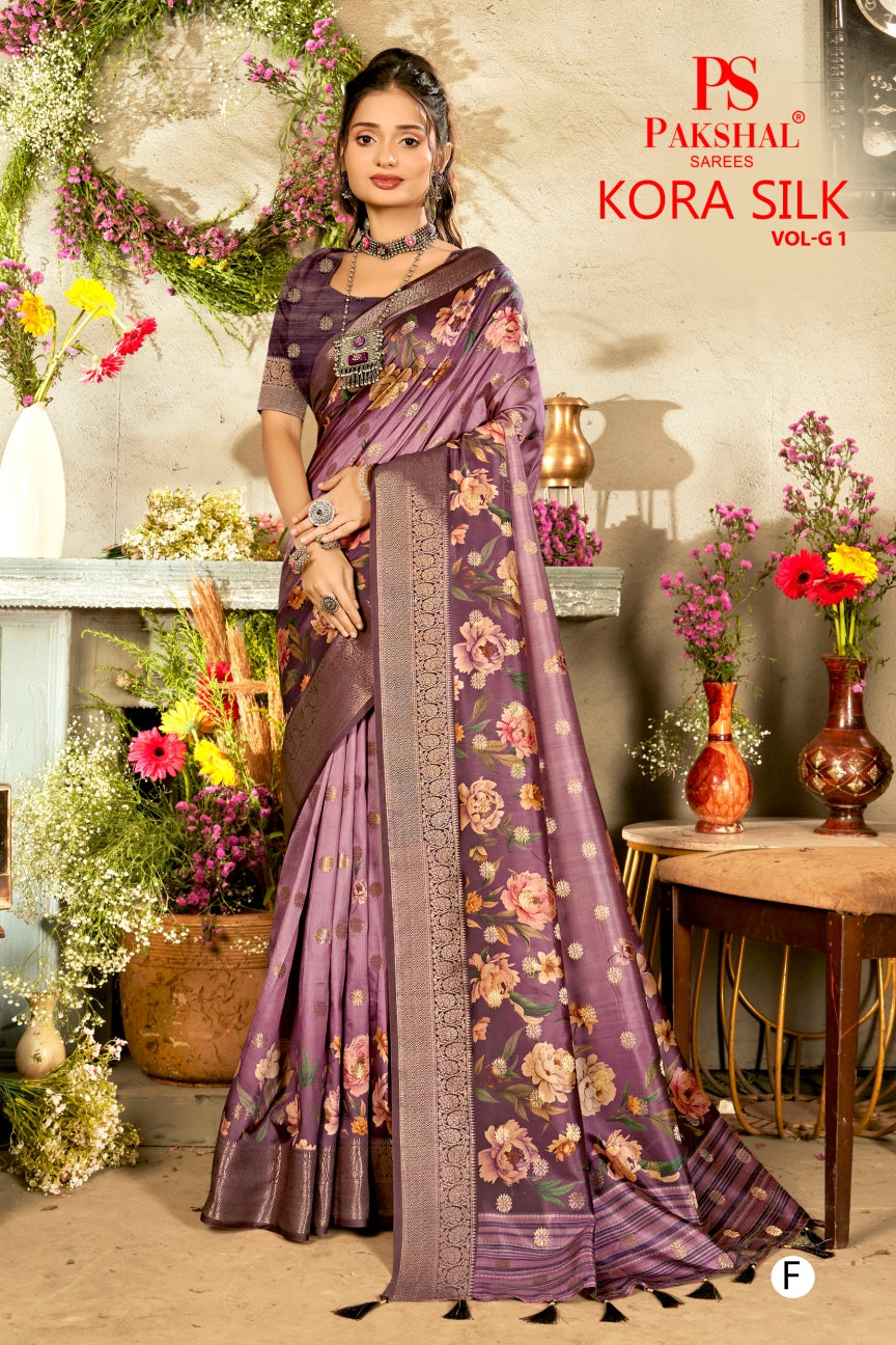 Lavender floral silk saree with woven gold border and patterned pallu