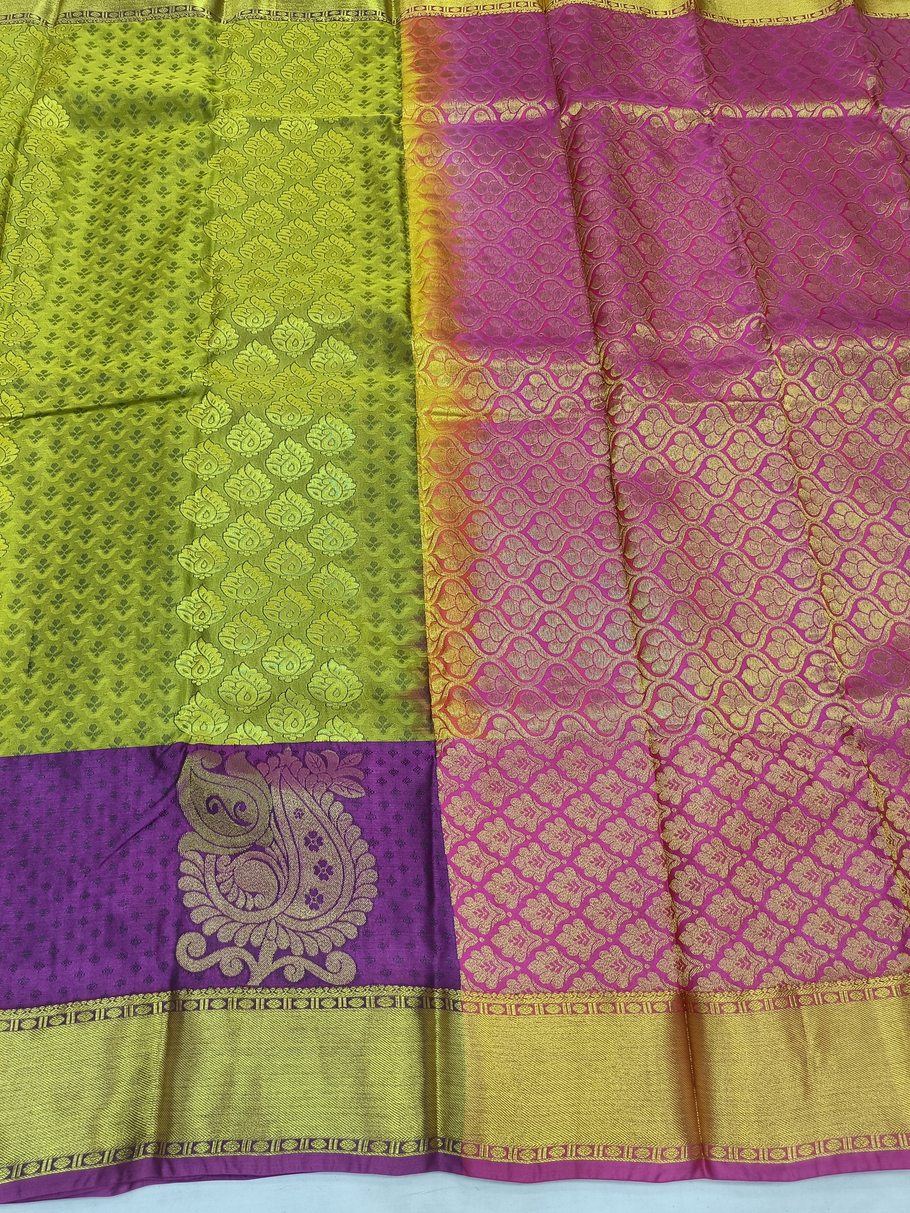 Olive silk body and purple pallu with gold zari motifs and patterned border