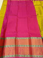 Pink Kanchipuram silk saree with yellow side panels, green border, woven motifs