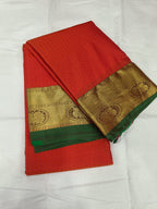 Red and olive-green silk saree with gold border and woven motifs
