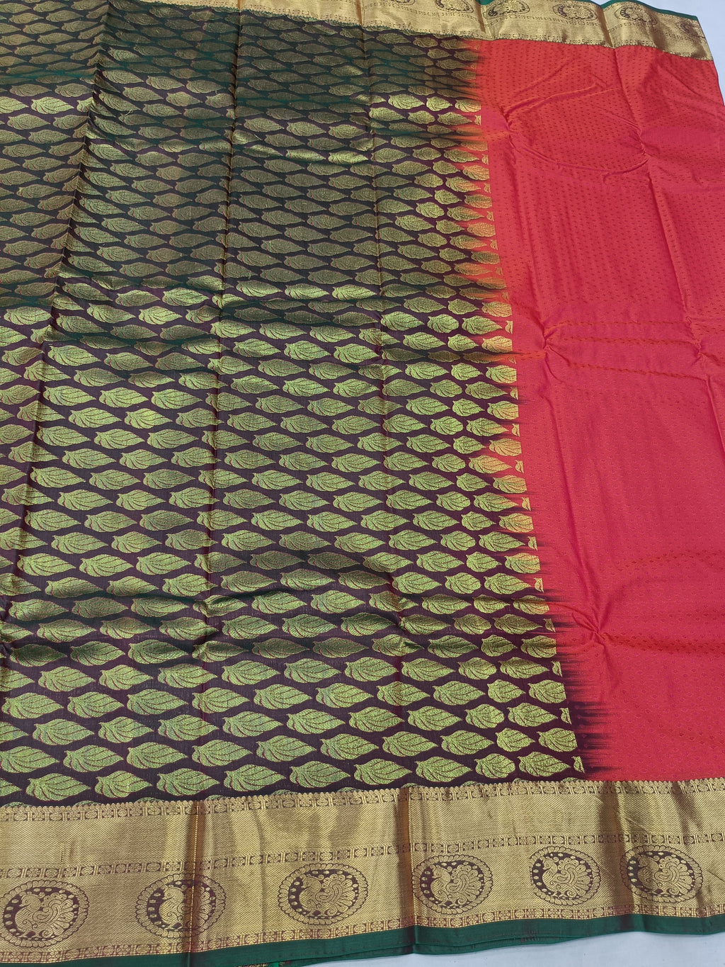Red saree with olive-green patterned body and wide gold border
