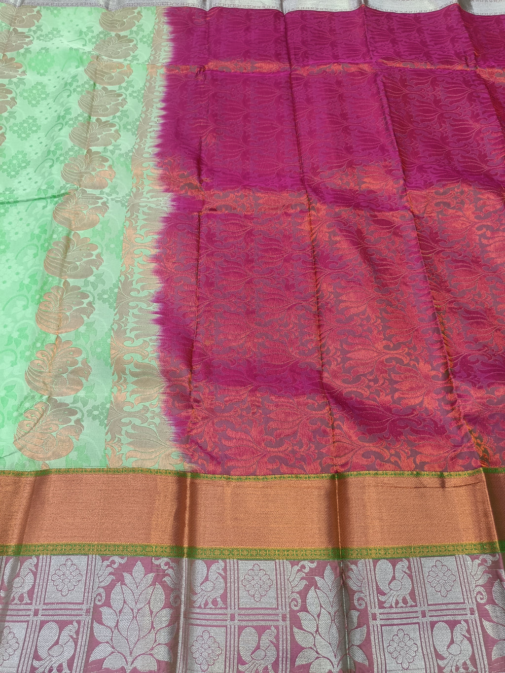 Kanchipuram silk saree in mint green and pink with gold zari border