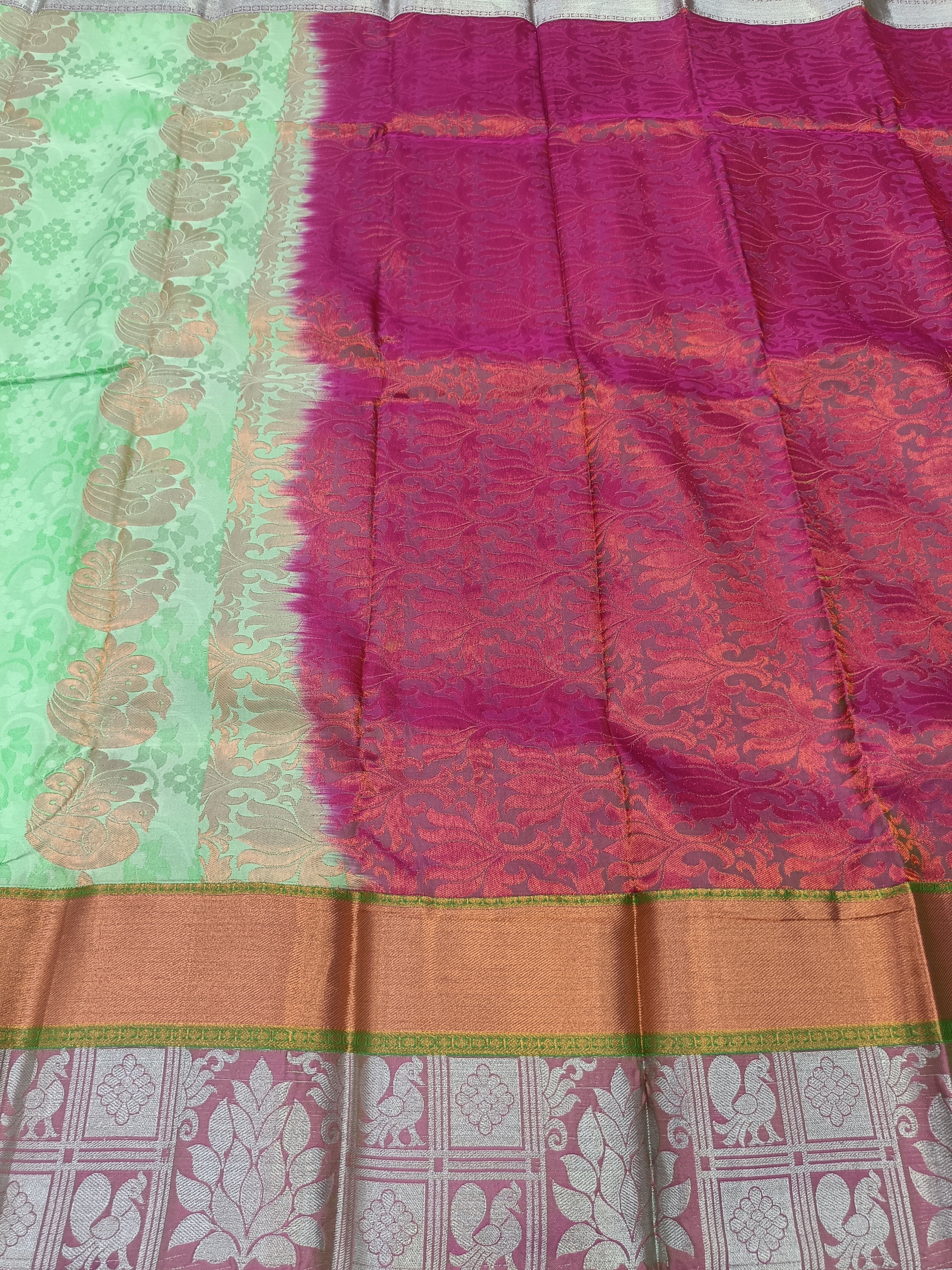Kanchipuram silk saree in mint green and pink with gold zari border