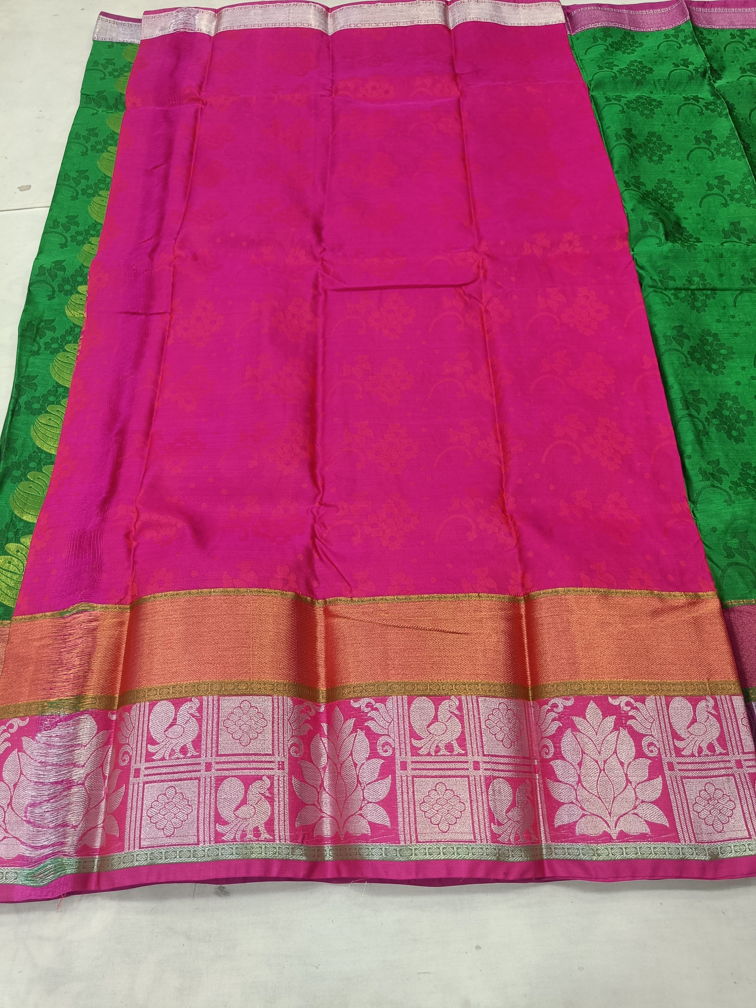 Green and pink silk saree panel with gold border stripe and woven motif hem