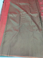 Pink and grey-beige saree body with fine weave texture and green-trim edge