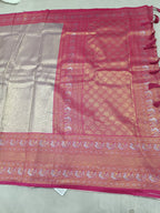 Banarasi silk saree with light grey body, magenta panel, and ornate pink-gold border
