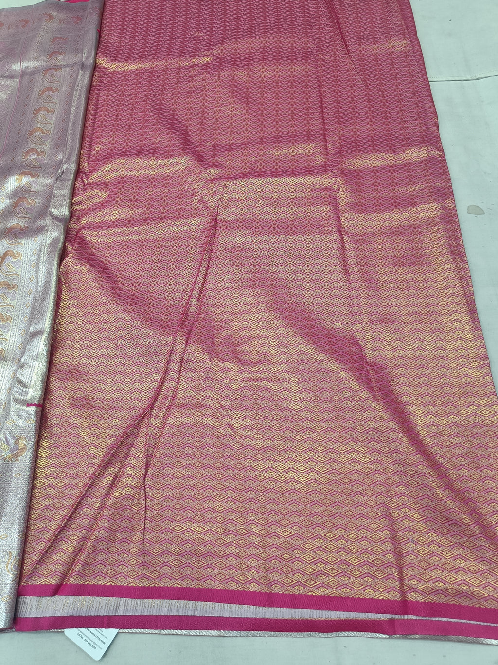 Pink Banarasi silk saree panel with gold-toned patterned checks and magenta border