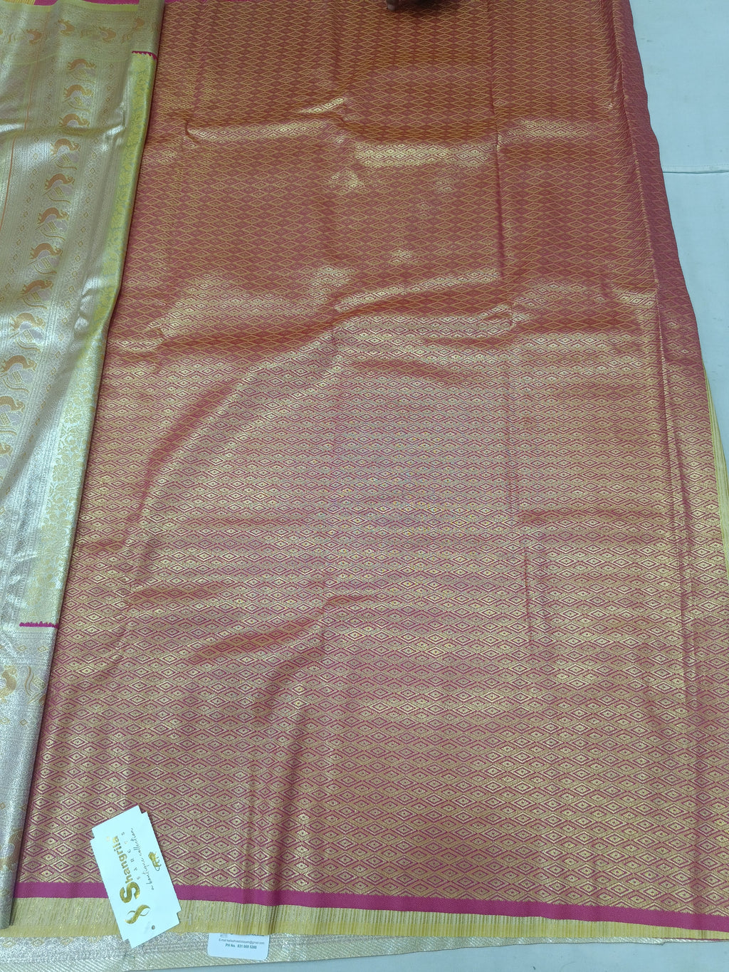 Gold Banarasi silk saree with pink woven pallu and separate unstitched blouse fabric