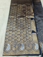 Navy blue saree fabric with gold lattice motifs and wide cream-gold border section