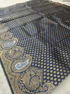 Navy blue Banarasi silk saree pallu with paisley medallion and gold vine border