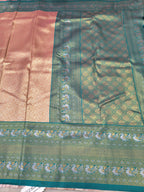 Aqua blue silk border with ornate gold woven medallions on peach saree panel