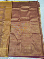 Banarasi silk saree in gold and maroon, woven panel with ornate border