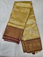 Banarasi silk saree, gold-beige body with maroon woven border and stripes
