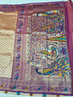 Banarasi silk saree pallu with multicolor peacock and floral motifs on light purple ground