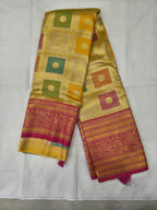 Banarasi silk saree in yellow with pink geometric motifs and woven gold border