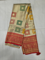 Gold and red Banarasi silk saree with green square motifs and red border
