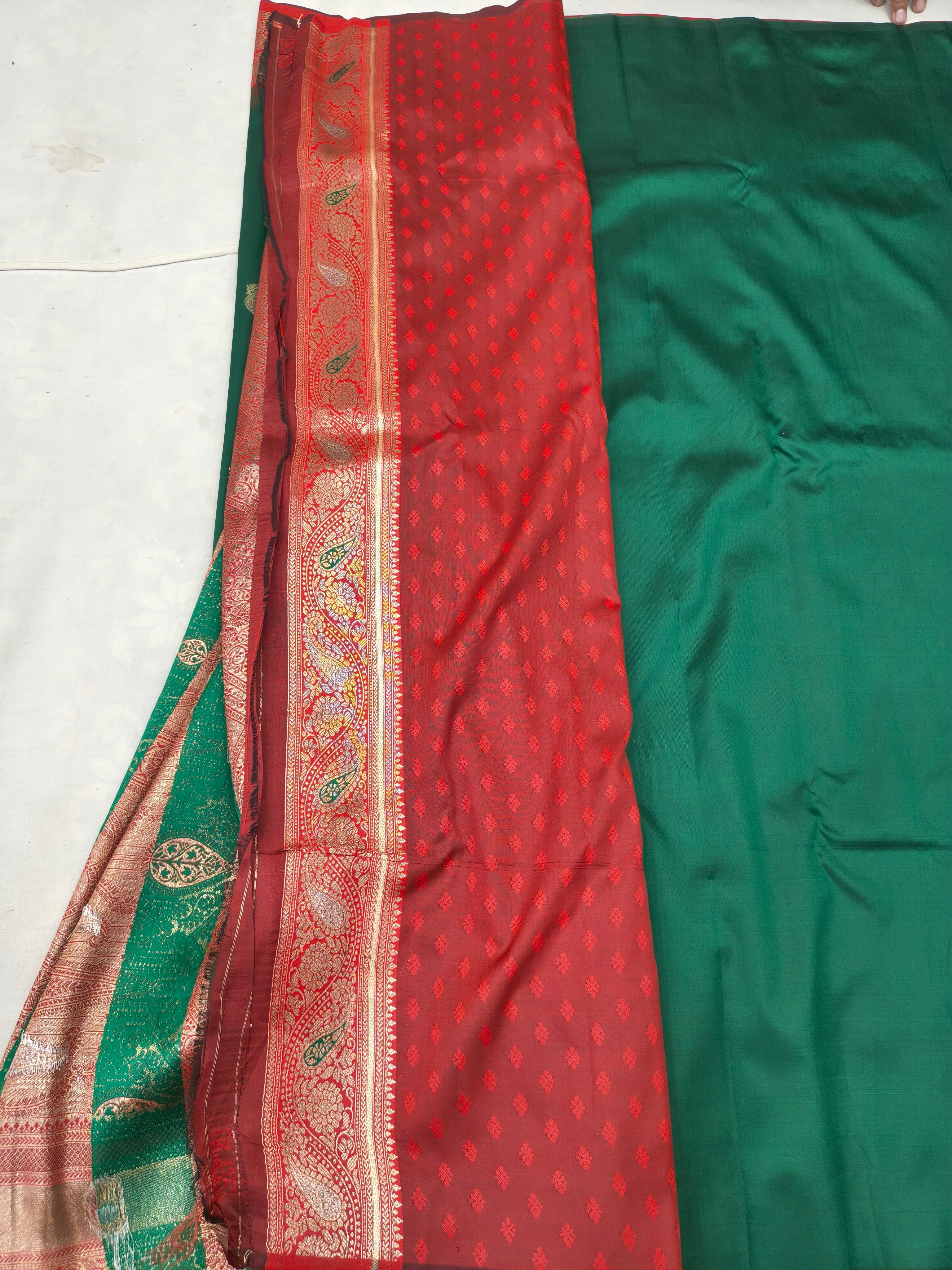 Teal and red silk saree with red pallu panel and contrasting patterned border