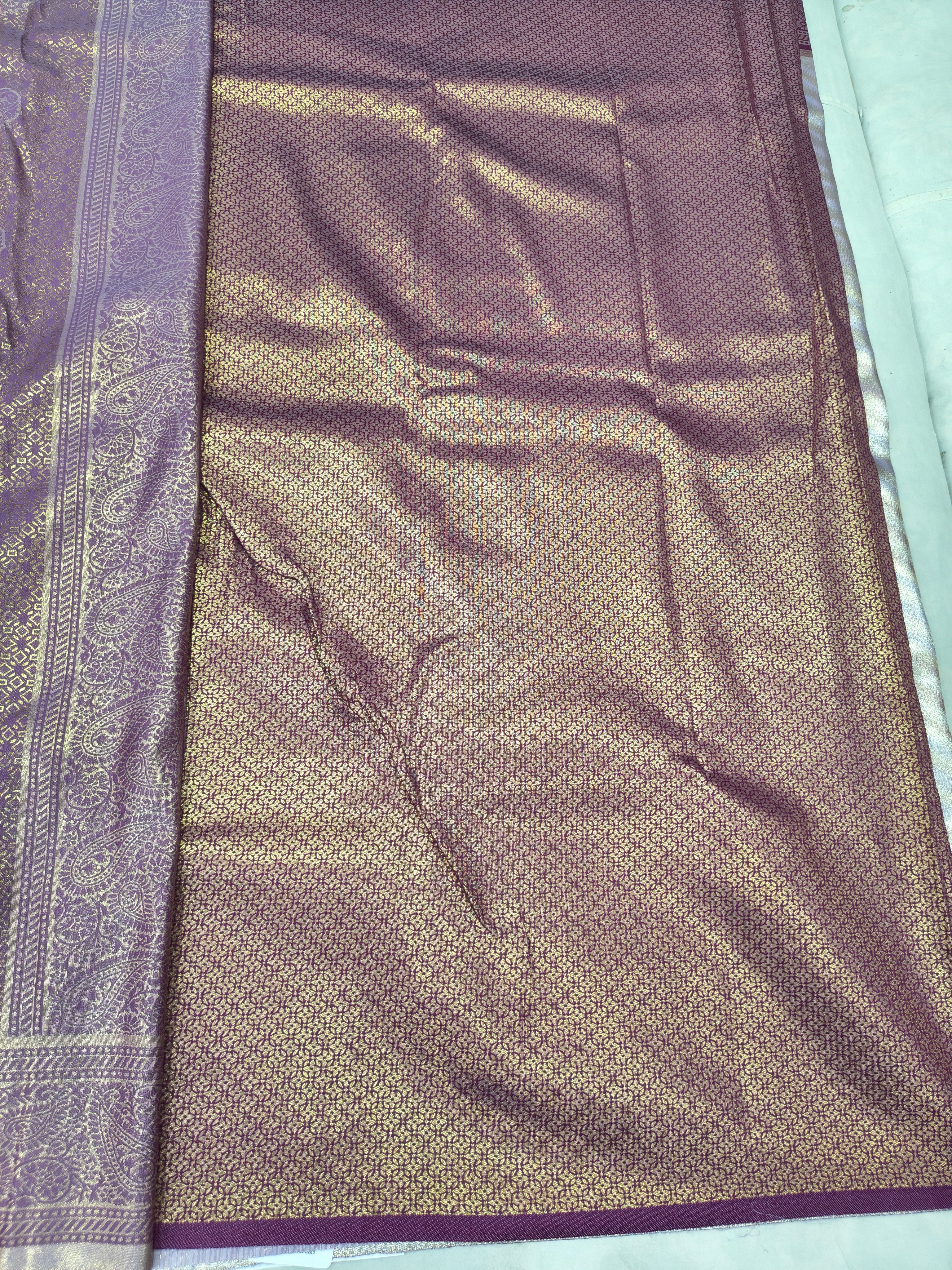 Silver and purple Banarasi silk saree fabric panel with damask-like woven texture
