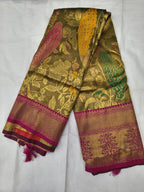 Olive and pink Banarasi silk saree with gold-tone botanical motifs and magenta border