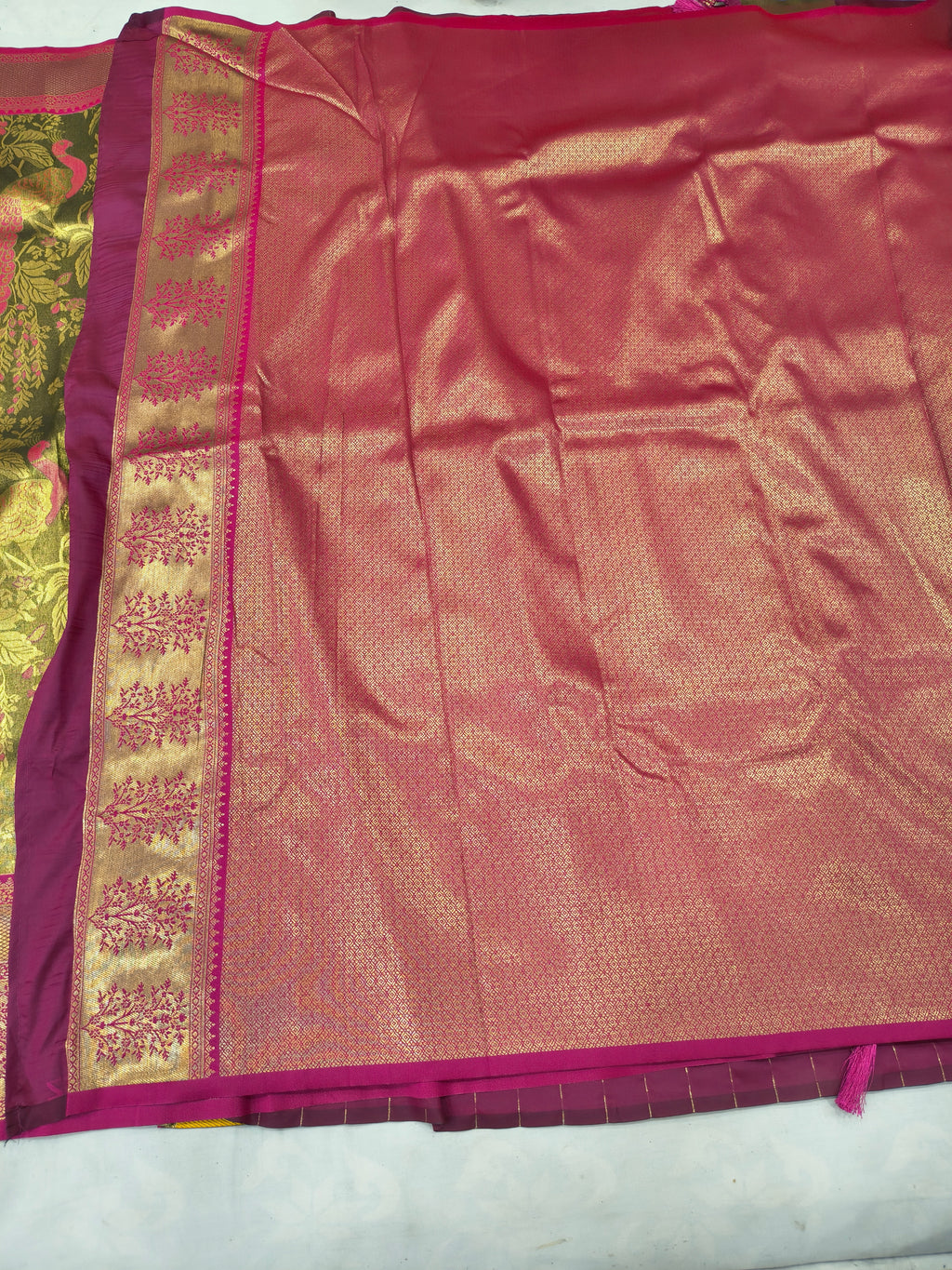 Olive and pink Banarasi silk pallu with gold woven texture and magenta border