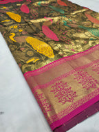 Olive-green silk saree with gold animal and floral motifs and pink-magenta border