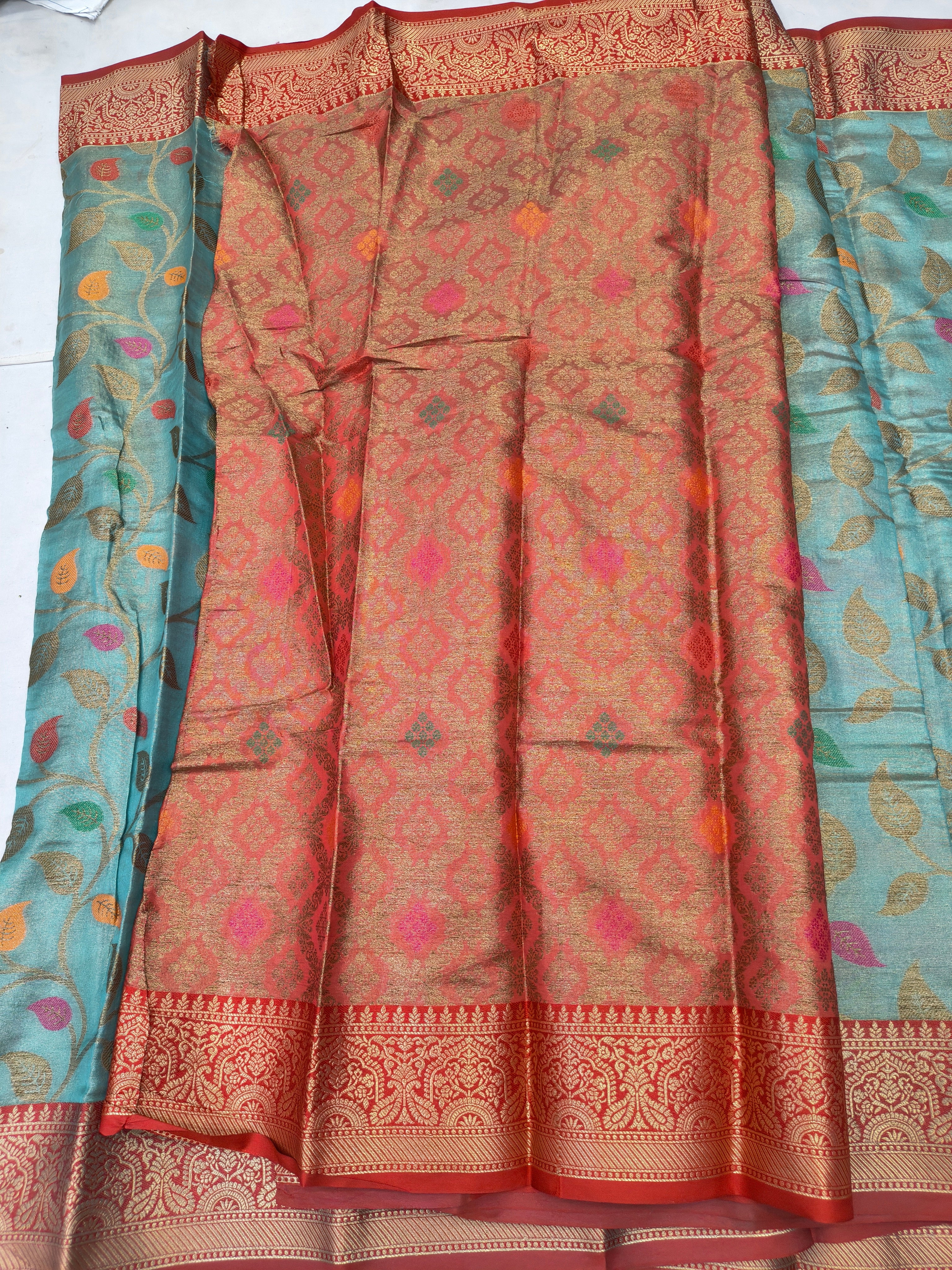 Turquoise and red Kanchipuram silk saree panel with ornate red-gold border