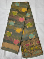 Dark grey silk saree folded, multicolor stripes and floral motifs with gold border
