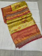 Yellow and pink Banarasi silk saree with woven motifs and contrast border