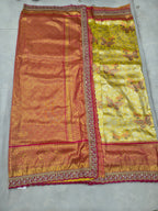 Dual-tone saree with orange-pink panel and yellow-gold panel, ornate border