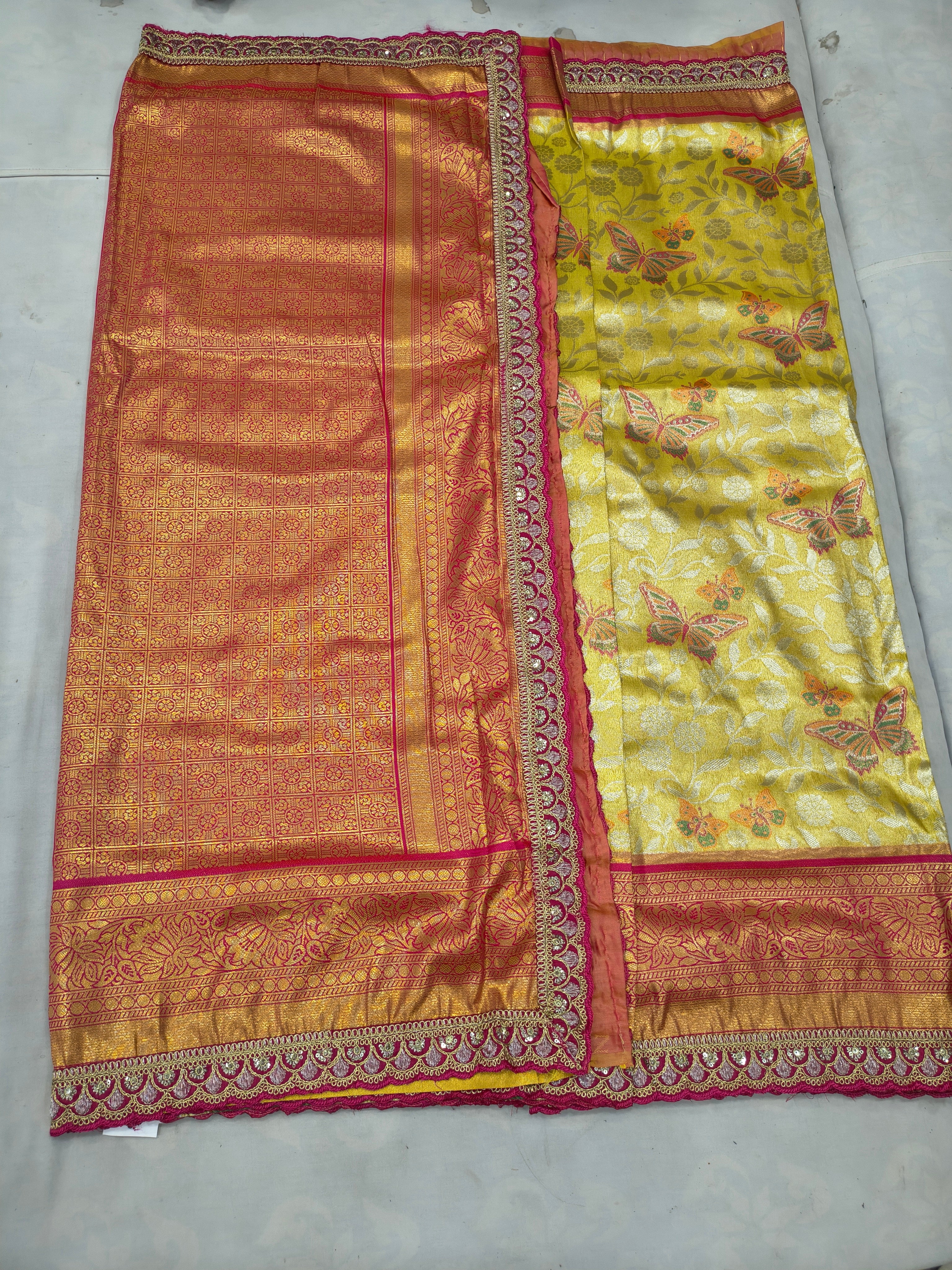 Dual-tone saree with orange-pink panel and yellow-gold panel, ornate border