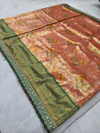 Peach and olive Banarasi silk saree spread view with floral vine motifs