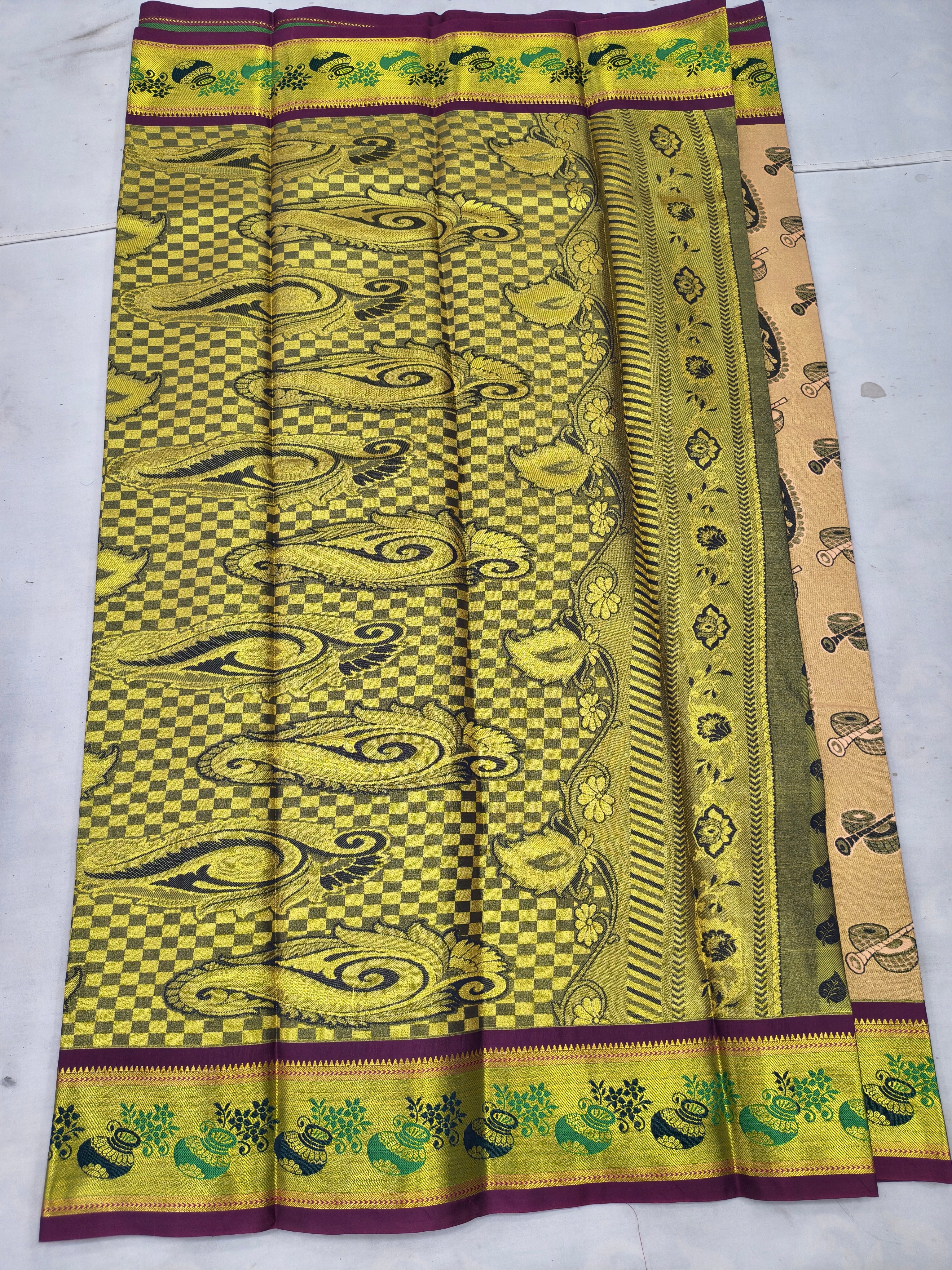 Beige Kanchipuram silk saree panel with green check and swirl motifs, purple trim