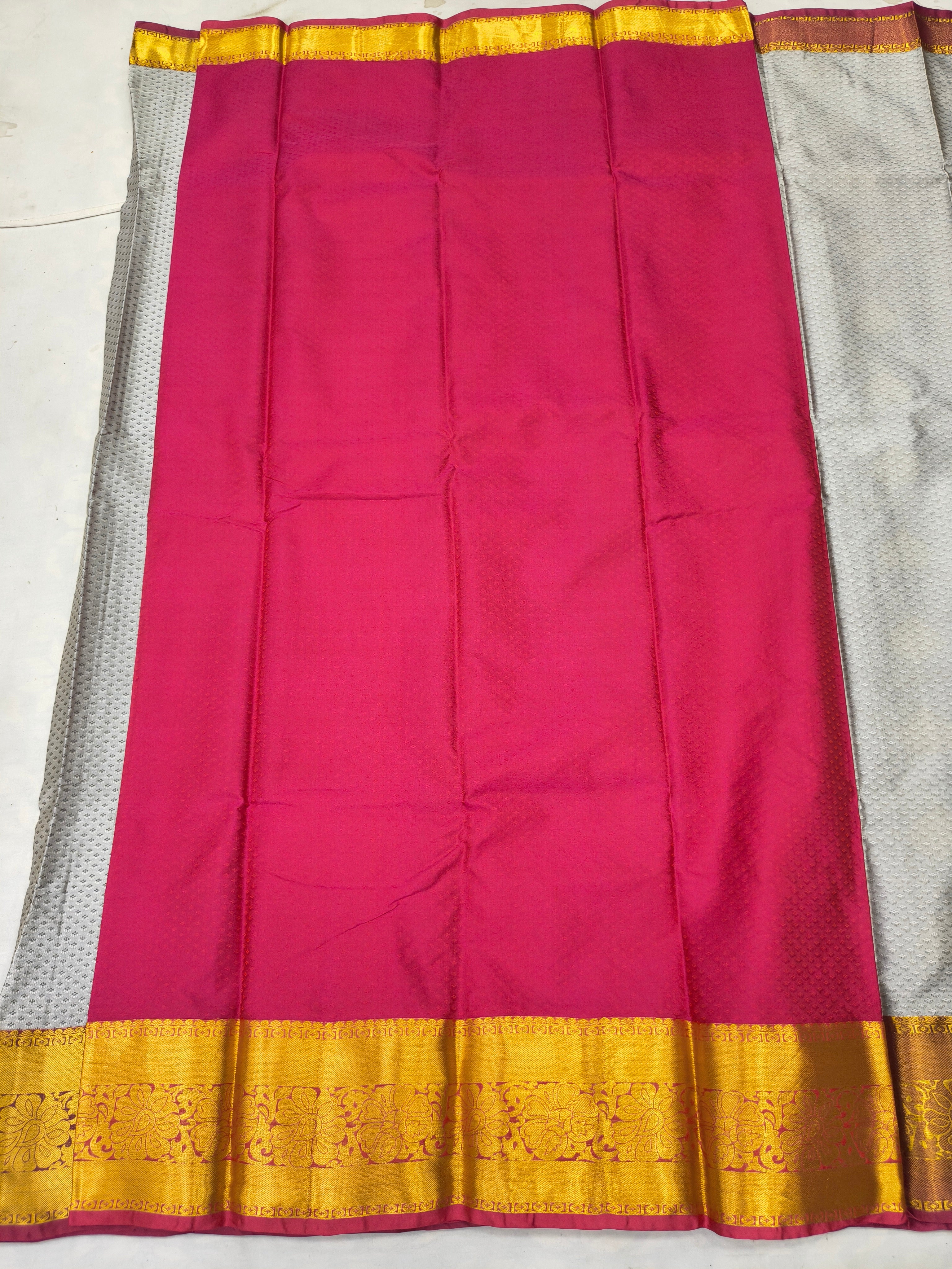Magenta saree panel with golden border and a grey patterned side section