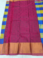 Kanchipuram silk saree pallu in magenta with textured pattern and peach border