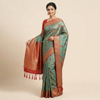 Women wearing sky-blue silk saree with red-gold border and floral pallu motifs